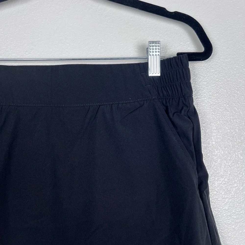 Halara Women's High Waisted Curved Hem Skort Pockets Black Sz M